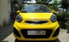 Kia Morning 1.25MT 2014 - Bán xe Kia Morning 1.25MT sản xuất năm 2014, màu vàng số sàn