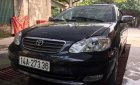 Toyota Corolla altis 1.8G MT 2005 - Bán Toyota Corolla altis 1.8G MT sản xuất năm 2005, màu đen số sàn, giá chỉ 285 triệu