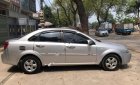 Daewoo Lacetti EX 2008 - Gia đình bán Daewoo Lacetti EX năm 2008, màu bạc số sàn