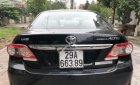 Toyota Corolla altis 1.8G MT 2013 - Bán Toyota Corolla Altis màu đen, số sàn, đời 2013