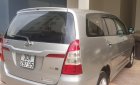 Toyota Innova 2.0E 2014 - Bán Toyota Innova 2.0E sản xuất 2014, màu bạc chính chủ 