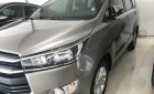 Toyota Innova 2.0E  2016 - Bán Toyota Innova 2.0E năm 2016, màu xám