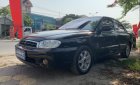 Kia Spectra 2004 - Cần bán lại xe Kia Spectra năm sản xuất 2004, màu đen giá cạnh tranh