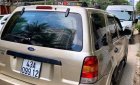 Ford Escape 3.0 V6 2002 - Cần bán lại xe Ford Escape 3.0 V6 năm sản xuất 2002, màu vàng