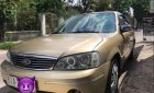 Ford Laser   1.8 AT 2003 - Cần bán lại xe Ford Laser 1.8 AT đời 2003, màu vàng, máy móc còn zin 100%