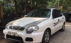 Daewoo Lanos  MT 2001 - Cần bán gấp Daewoo Lanos MT sản xuất năm 2001, màu trắng, xe gia đình đang đi