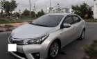 Toyota Corolla altis G 2014 - Bán Toyota Corolla altis G 1.8MT, màu bạc, sx 2014 form mới