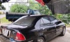 Ford Laser   Ghia   2004 - Cần bán xe Ford Laser Ghia sản xuất năm 2004, màu đen