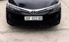 Toyota Corolla altis 1.8E 2018 - Bán Toyota Corolla altis 1.8E năm 2018, màu đen, số sàn