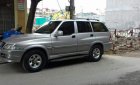 Ssangyong Musso 2.4AT 2004 - Cần bán xe Ssangyong Musso 2.4AT 2004, màu bạc