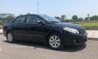 Toyota Corolla altis   2010 - Cần bán Toyota Corolla altis sản xuất năm 2010, màu đen, xe 1 chủ từ đầu