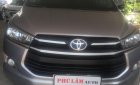 Toyota Innova E 2016 - Cần bán Toyota Innova E đời 2017 số sàn, màu nâu