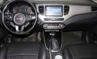 Kia Rondo GAT 2016 - Cần bán Kia Rondo GAT năm sản xuất 2016, màu đen, 600tr