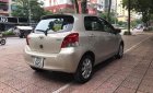 Toyota Yaris   2009 - Bán xe Toyota Yaris năm 2009, màu vàng, xe nhập