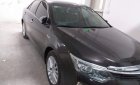 Toyota Camry  2.0E  2017 - Bán gấp Camry 2.0E 2017 màu đen, xe đi được 24.000 km, như mới