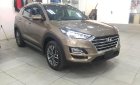 Hyundai Tucson 2.0 AT CRDi 2019 - Bán xe Hyundai Tucson 2.0 AT CRDi sản xuất năm 2019, màu vàng 