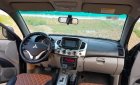 Mitsubishi Triton GLS 4x4 MT 2014 - Cần bán lại xe Mitsubishi Triton GLS 4x4 MT năm 2014, màu đen 