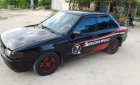 Mazda 323 1996 - Bán Mazda 323 sản xuất năm 1996, màu đen, xe nhập