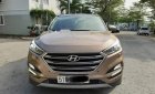 Hyundai Tucson    2018 - Bán Hyundai Tucson đời 2018, màu nâu ít sử dụng, 895tr