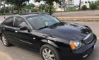 Daewoo Magnus 2005 - Bán ô tô Daewoo Magnus đời 2005, màu đen xe gia đình