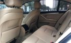 BMW 5 Series 520i 2.0AT 2014 - Chính chủ bán BMW 520i màu trắng kem SX 2015, cửa hít, màn NBT, loa Harman