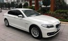 BMW 5 Series 520i 2.0AT 2014 - Chính chủ bán BMW 520i màu trắng kem SX 2015, cửa hít, màn NBT, loa Harman