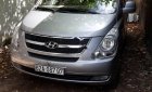 Hyundai Grand Starex 2.5 MT 2014 - Bán 1 xe Hyundai Grand Starex 9 chỗ máy dầu, đời 2014, màu bạc, phiên bản ghế xoay