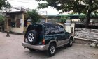 Suzuki Vitara JLX 2004 - Bán Suzuki Vitara màu xanh, xe đẹp, vừa thay côn, lốp mới