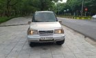 Suzuki Vitara 2004 - Bán Suzuki Vitara sản xuất năm 2004, màu vàng, số sàn 2 cầu