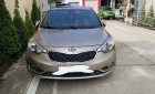 Kia K3 1.6AT 2015 - Bán Kia K3 1.6AT năm sản xuất cuối 2015, màu vàng cát