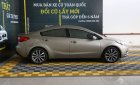 Kia K3 1.6MT 2015 - Bán Kia K3 1.6MT màu vàng cát, số sàn, sản xuất 2015, biển Bình Dương đi 58000km