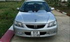 Mazda 323   2003 - Cần bán lại xe Mazda 323 đời 2003, màu bạc