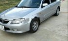 Mazda 323   2003 - Cần bán lại xe Mazda 323 đời 2003, màu bạc