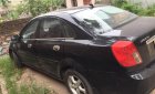 Daewoo Lacetti 2005 - Gia đình bán xe Daewoo Lacetti đời 2005, màu đen