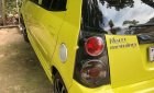 Kia Morning  AT 2012 - Cần bán xe Kia Morning AT năm sản xuất 2012, màu vàng còn mới, giá 241tr
