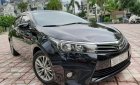 Toyota Corolla altis 1.8G 2015 - Bán Toyota Corolla altis 1.8G đời 2015, màu đen