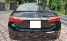 Toyota Corolla altis 1.8G AT 2015 - Bán ô tô Toyota Corolla altis 1.8G AT 2015, màu đen