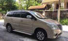 Toyota Innova   2014 - Bán xe Toyota Innova đời 2014, màu vàng cát, số sàn, 458tr