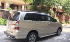 Toyota Innova   2014 - Bán xe Toyota Innova đời 2014, màu vàng cát, số sàn, 458tr