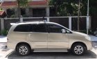 Toyota Innova 2.0E 2014 - Bán Toyota Innova 2.0E đời 2014, màu vàng số sàn