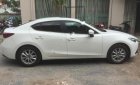 Mazda 3 2016 - Cần bán gấp Mazda 3 đời 2016, màu trắng số tự động, 620 triệu