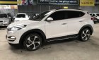 Hyundai Tucson 1.6 Turbo 2017 - Bán Hyundai Tucson 1.6 Turbo màu trắng camay, máy xăng, số tự động, sản xuất 12/2017, một chủ đi 29000km