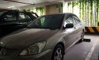 Mitsubishi Lancer   2005 - Cần bán Mitsubishi Lancer sản xuất 2005, màu vàng cát, giá tốt