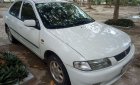 Mazda 323 1.6 2000 - Gia đình bán Mazda 323 1.6 đời 2000, màu trắng, xe nhập