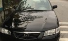 Mazda 626 2001 - Bán ô tô Mazda 626 năm 2001, màu đen còn mới giá tốt 155 triệu đồng