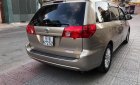 Toyota Sienna 2008 - Gia đình bán xe Toyota Sienna sản xuất 2008, màu vàng, xe nhập