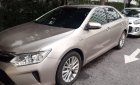 Toyota Camry 2017 - Chính chủ bán Toyota Camry sản xuất 2017, màu vàng, giá chỉ 860 triệu