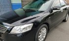 Toyota Camry 2.4G 2011 - Bán ô tô Toyota Camry 2.4G 2011, màu đen, giá 650tr