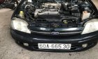 Ford Laser   2000 - Bán Ford Laser năm sản xuất 2000, màu đen, xe nhập