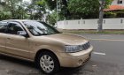 Ford Laser 2004 - Ford Laser 1.8 số tự động, vàng cát 2004